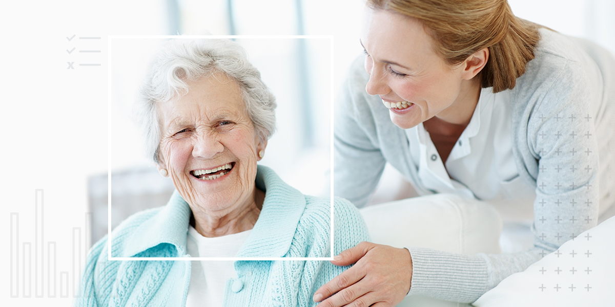 A nurse laughing with an elderly resident and keeping her engaged for the blog post about how to pptimize resident engagement and measure success