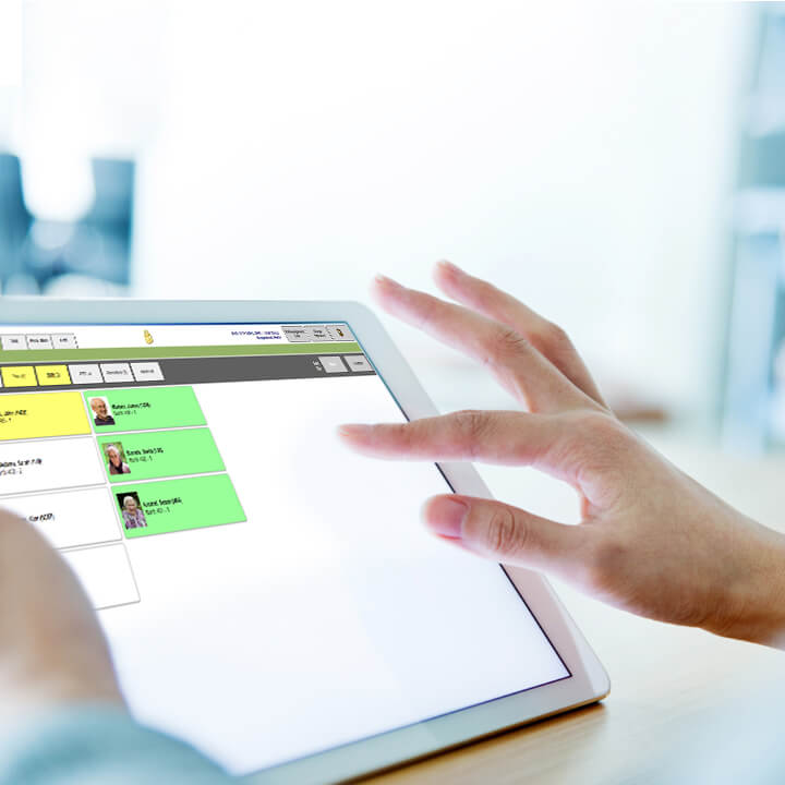 PointClickCare's eMAR product being used on tablet device