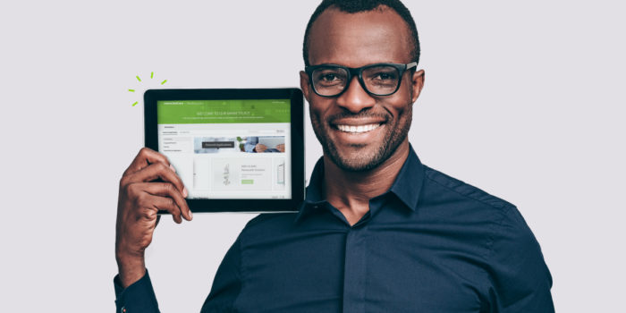man holding tablet with PointClickCare Marketplace homepage on it