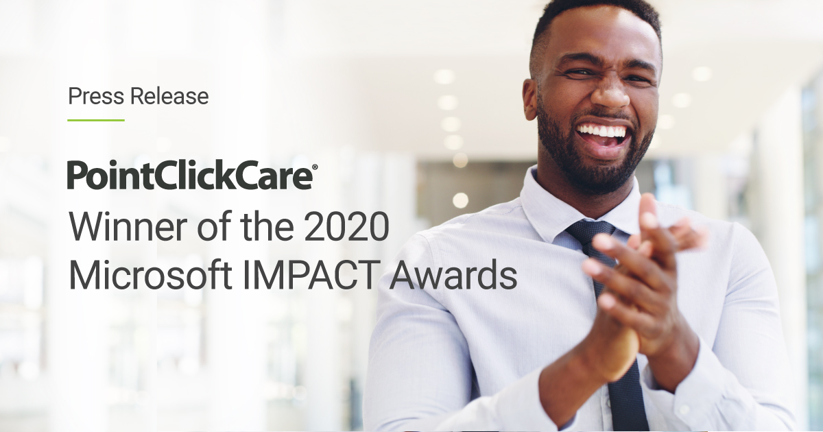 A man clapping as PointClickCare is announced winner of the 2020 Microsoft IMPACT award