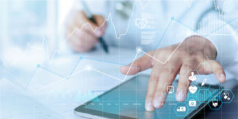 An illustration of an epidemiologist working with PointClickCare's software on a tablet to gather insights and learnings