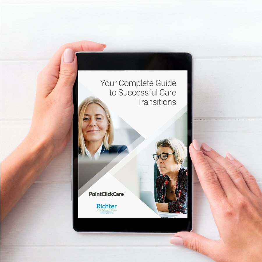 Closeup of woman's hands holding a tablet that has PointClickCare's Complete Guide to Successful Care Transitions open