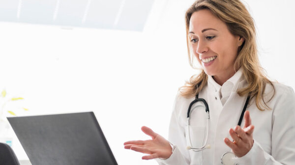 Doctor communicating virtually with patient