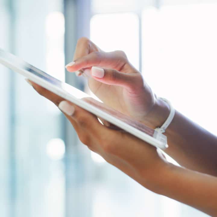 IPC Incorporate Best Practices closeup hand on tablet